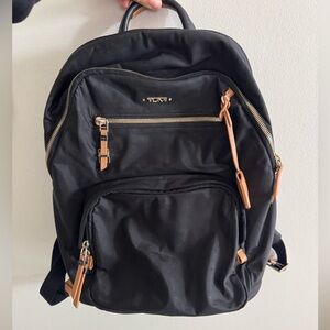 Tumi Black Backpack with Brown Details